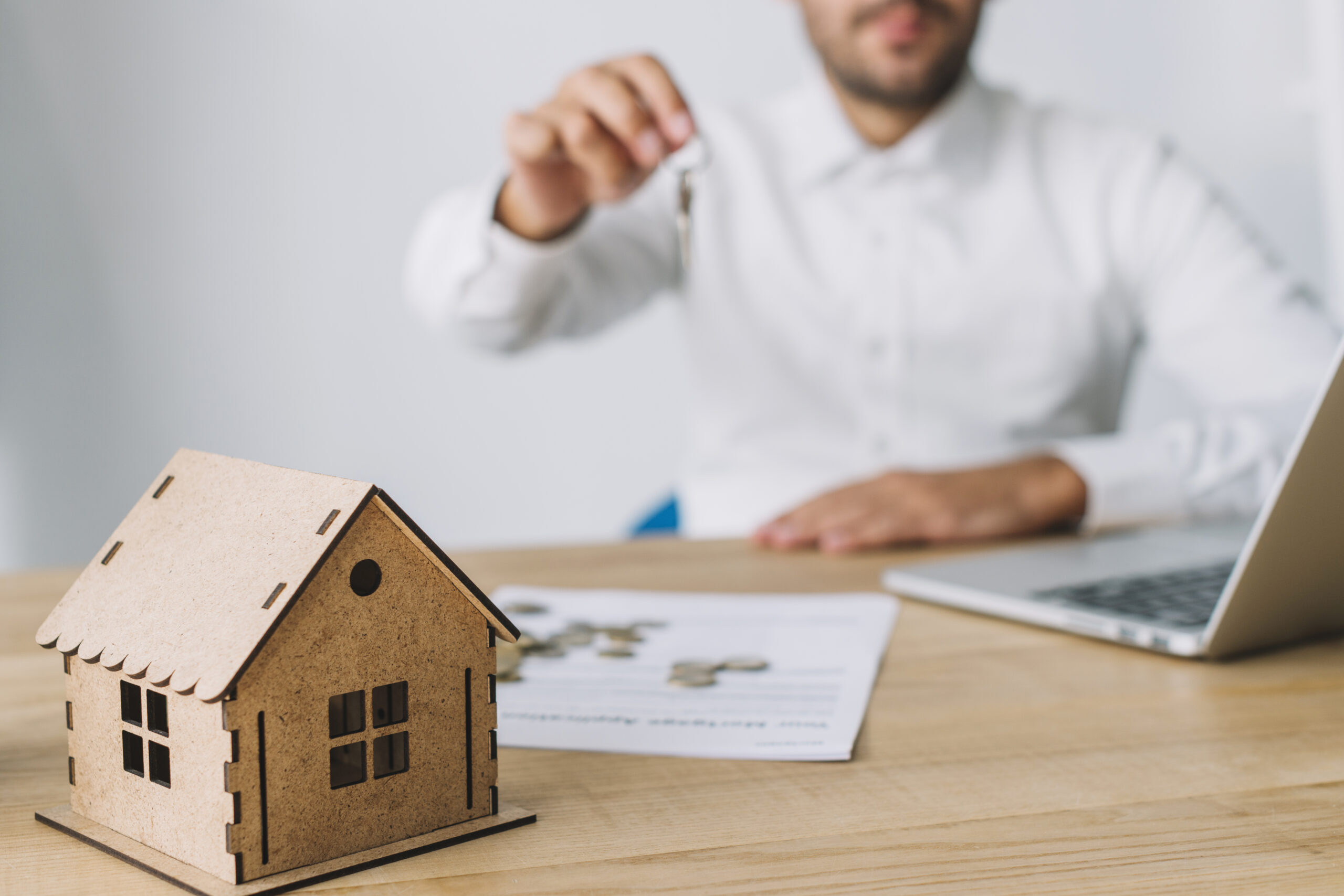 house-near-real-estate-agent-with-keys - Sandra Brown Mortgages Private Mortgages