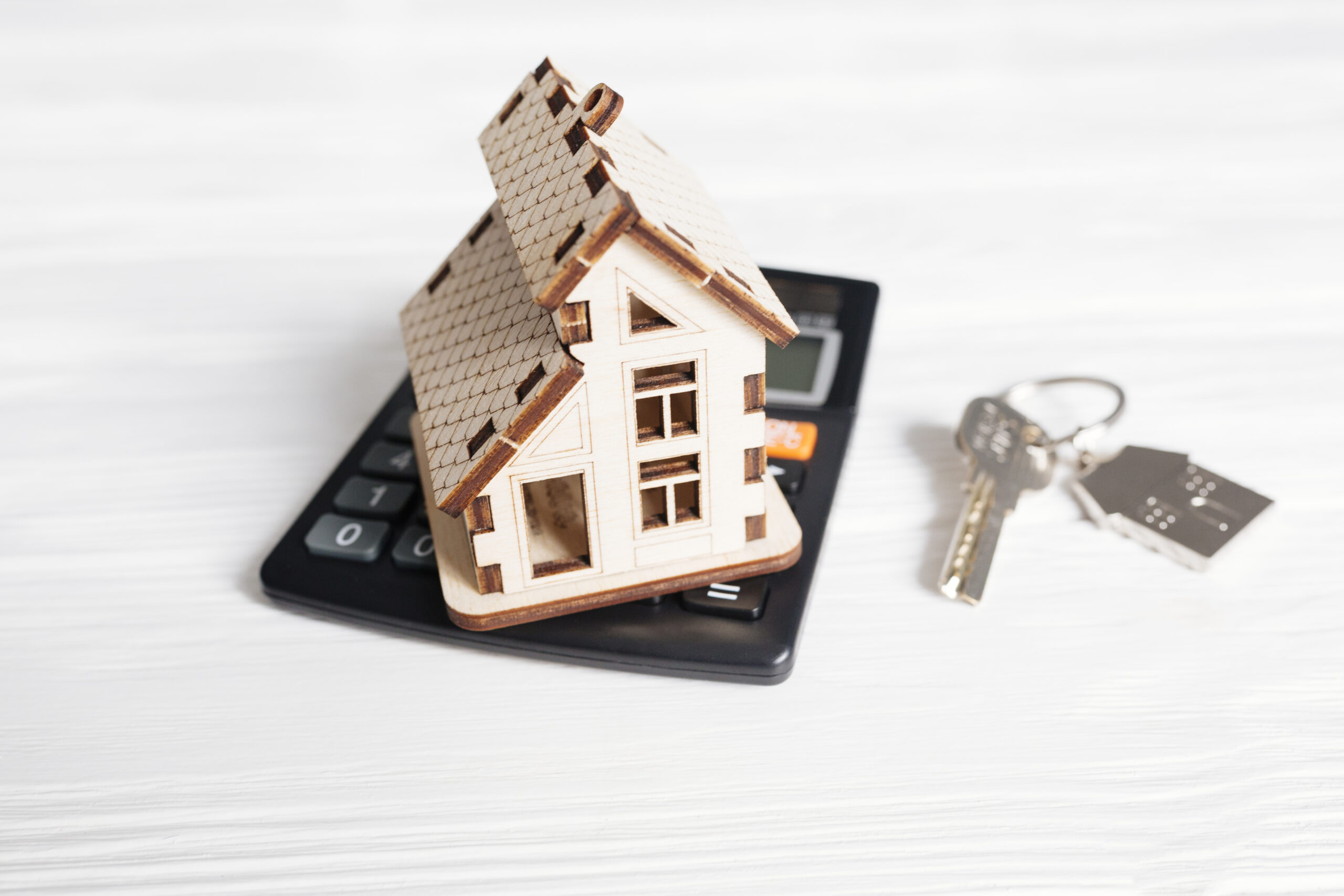 wooden-house-calculator 1 - Sandra Brown Mortgages All in one Mortgage